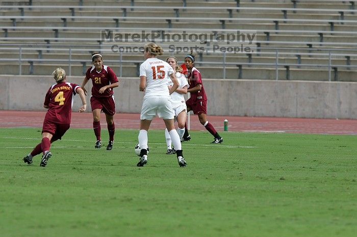 UT sophomore Niki Arlitt (#11, Forward) passes the ball to UT freshman Kylie Doniak (#15, Midfielder).  The University of Texas women's soccer team won 2-1 against the Iowa State Cyclones Sunday afternoon, October 5, 2008.

Filename: SRM_20081005_12095244.jpg
Aperture: f/5.6
Shutter Speed: 1/2000
Body: Canon EOS-1D Mark II
Lens: Canon EF 300mm f/2.8 L IS