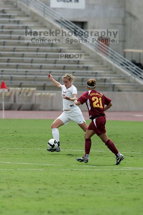 UT freshman Kylie Doniak (#15, Midfielder).  The University of Texas women's soccer team won 2-1 against the Iowa State Cyclones Sunday afternoon, October 5, 2008.

Filename: SRM_20081005_12114847.jpg
Aperture: f/5.6
Shutter Speed: 1/2000
Body: Canon EOS-1D Mark II
Lens: Canon EF 300mm f/2.8 L IS