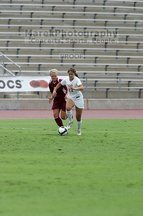 UT sophomore Alisha Ortiz (#12, Forward).  The University of Texas women's soccer team won 2-1 against the Iowa State Cyclones Sunday afternoon, October 5, 2008.

Filename: SRM_20081005_12115855.jpg
Aperture: f/5.6
Shutter Speed: 1/1600
Body: Canon EOS-1D Mark II
Lens: Canon EF 300mm f/2.8 L IS