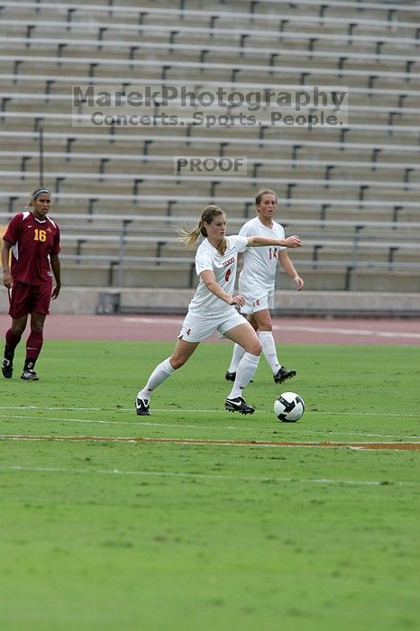 UT senior Jill Gilbeau (#4, Defender and Midfielder).  The University of Texas women's soccer team won 2-1 against the Iowa State Cyclones Sunday afternoon, October 5, 2008.

Filename: SRM_20081005_12120259.jpg
Aperture: f/5.6
Shutter Speed: 1/1600
Body: Canon EOS-1D Mark II
Lens: Canon EF 300mm f/2.8 L IS