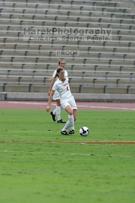 UT senior Jill Gilbeau (#4, Defender and Midfielder).  The University of Texas women's soccer team won 2-1 against the Iowa State Cyclones Sunday afternoon, October 5, 2008.

Filename: SRM_20081005_12120260.jpg
Aperture: f/5.6
Shutter Speed: 1/2000
Body: Canon EOS-1D Mark II
Lens: Canon EF 300mm f/2.8 L IS