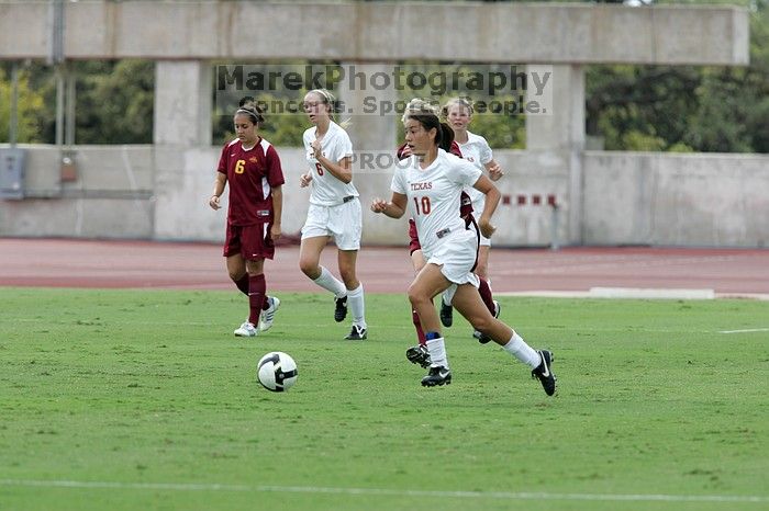 UT senior Stephanie Logterman (#10, Defender).  The University of Texas women's soccer team won 2-1 against the Iowa State Cyclones Sunday afternoon, October 5, 2008.

Filename: SRM_20081005_12122878.jpg
Aperture: f/5.6
Shutter Speed: 1/1250
Body: Canon EOS-1D Mark II
Lens: Canon EF 300mm f/2.8 L IS