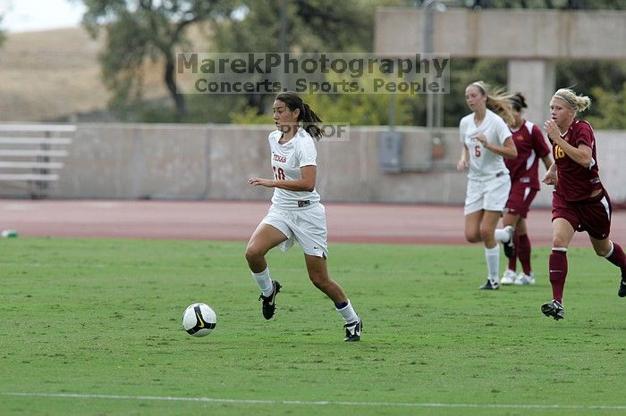 UT senior Stephanie Logterman (#10, Defender).  The University of Texas women's soccer team won 2-1 against the Iowa State Cyclones Sunday afternoon, October 5, 2008.

Filename: SRM_20081005_12123079.jpg
Aperture: f/5.6
Shutter Speed: 1/1600
Body: Canon EOS-1D Mark II
Lens: Canon EF 300mm f/2.8 L IS