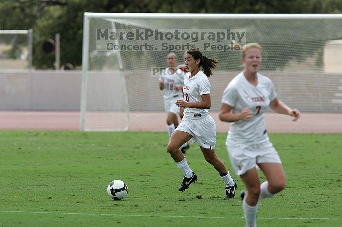 UT senior Stephanie Logterman (#10, Defender).  The University of Texas women's soccer team won 2-1 against the Iowa State Cyclones Sunday afternoon, October 5, 2008.

Filename: SRM_20081005_12123081.jpg
Aperture: f/5.6
Shutter Speed: 1/2000
Body: Canon EOS-1D Mark II
Lens: Canon EF 300mm f/2.8 L IS