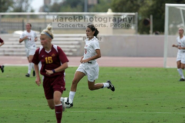 UT senior Stephanie Logterman (#10, Defender).  The University of Texas women's soccer team won 2-1 against the Iowa State Cyclones Sunday afternoon, October 5, 2008.

Filename: SRM_20081005_12123284.jpg
Aperture: f/5.6
Shutter Speed: 1/2000
Body: Canon EOS-1D Mark II
Lens: Canon EF 300mm f/2.8 L IS