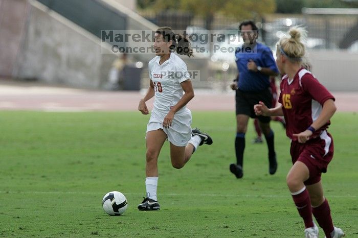 UT senior Stephanie Logterman (#10, Defender).  The University of Texas women's soccer team won 2-1 against the Iowa State Cyclones Sunday afternoon, October 5, 2008.

Filename: SRM_20081005_12123287.jpg
Aperture: f/5.6
Shutter Speed: 1/1600
Body: Canon EOS-1D Mark II
Lens: Canon EF 300mm f/2.8 L IS