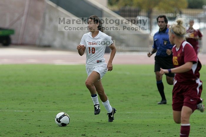 UT senior Stephanie Logterman (#10, Defender).  The University of Texas women's soccer team won 2-1 against the Iowa State Cyclones Sunday afternoon, October 5, 2008.

Filename: SRM_20081005_12123288.jpg
Aperture: f/5.6
Shutter Speed: 1/2000
Body: Canon EOS-1D Mark II
Lens: Canon EF 300mm f/2.8 L IS