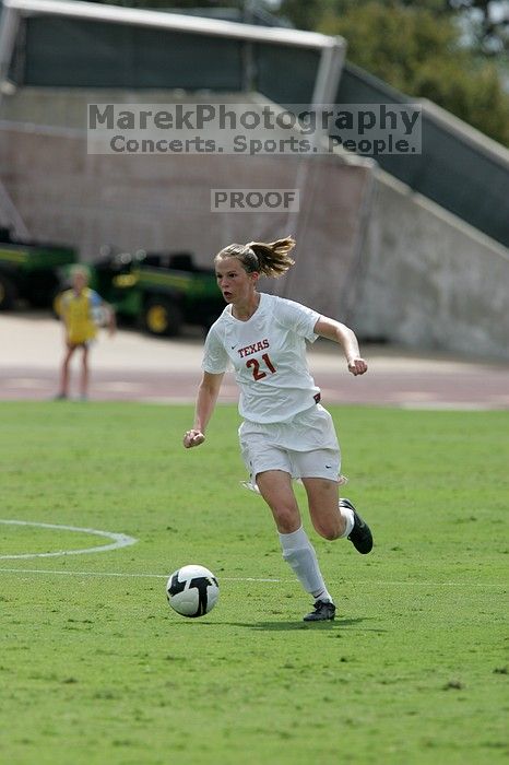 UT junior Emily Anderson (#21, Forward).  The Uniiversity of Texas women's soccer team won 2-1 against the Iowa State Cyclones Sunday afternoon, October 5, 2008.

Filename: SRM_20081005_12135492.jpg
Aperture: f/5.6
Shutter Speed: 1/2500
Body: Canon EOS-1D Mark II
Lens: Canon EF 300mm f/2.8 L IS