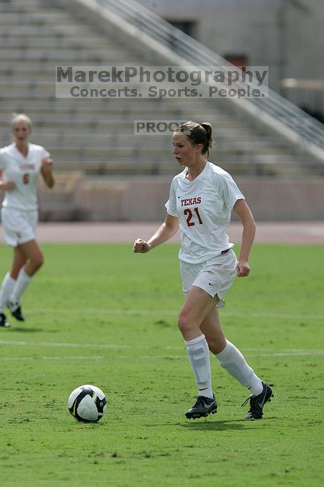 UT junior Emily Anderson (#21, Forward).  The Uniiversity of Texas women's soccer team won 2-1 against the Iowa State Cyclones Sunday afternoon, October 5, 2008.

Filename: SRM_20081005_12135696.jpg
Aperture: f/5.6
Shutter Speed: 1/2500
Body: Canon EOS-1D Mark II
Lens: Canon EF 300mm f/2.8 L IS