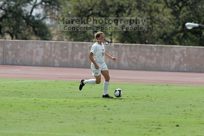 UT senior Kasey Moore (#14, Defender).  The University of Texas women's soccer team won 2-1 against the Iowa State Cyclones Sunday afternoon, October 5, 2008.

Filename: SRM_20081005_12142009.jpg
Aperture: f/5.6
Shutter Speed: 1/2000
Body: Canon EOS-1D Mark II
Lens: Canon EF 300mm f/2.8 L IS