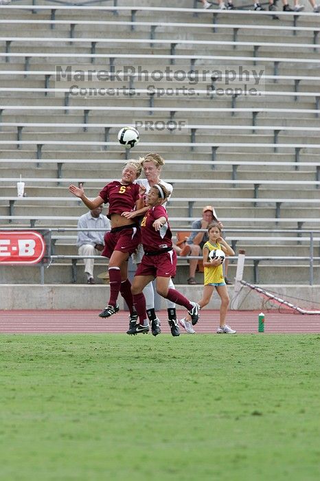 UT freshman Kylie Doniak (#15, Midfielder) jumps for the header.  The University of Texas women's soccer team won 2-1 against the Iowa State Cyclones Sunday afternoon, October 5, 2008.

Filename: SRM_20081005_12152613.jpg
Aperture: f/5.6
Shutter Speed: 1/1000
Body: Canon EOS-1D Mark II
Lens: Canon EF 300mm f/2.8 L IS