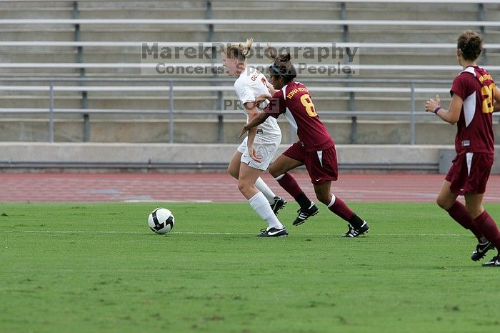 UT freshman Courtney Goodson (#7, Forward and Midfielder) takes the ball down the sideline.  The University of Texas women's soccer team won 2-1 against the Iowa State Cyclones Sunday afternoon, October 5, 2008.

Filename: SRM_20081005_12153220.jpg
Aperture: f/5.6
Shutter Speed: 1/1250
Body: Canon EOS-1D Mark II
Lens: Canon EF 300mm f/2.8 L IS