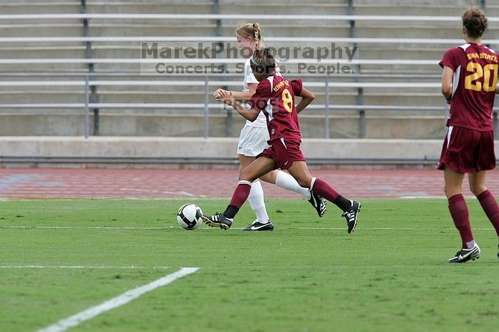 UT freshman Courtney Goodson (#7, Forward and Midfielder) takes the ball down the sideline.  The University of Texas women's soccer team won 2-1 against the Iowa State Cyclones Sunday afternoon, October 5, 2008.

Filename: SRM_20081005_12153223.jpg
Aperture: f/5.6
Shutter Speed: 1/1000
Body: Canon EOS-1D Mark II
Lens: Canon EF 300mm f/2.8 L IS