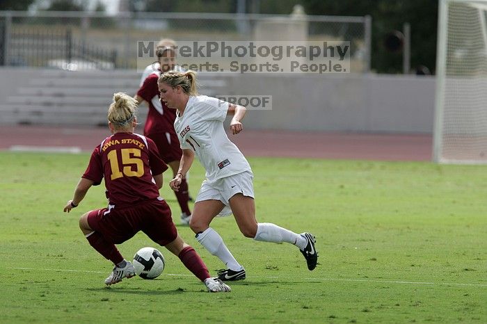 UT sophomore Niki Arlitt (#11, Forward).  The University of Texas women's soccer team won 2-1 against the Iowa State Cyclones Sunday afternoon, October 5, 2008.

Filename: SRM_20081005_12171035.jpg
Aperture: f/5.6
Shutter Speed: 1/2000
Body: Canon EOS-1D Mark II
Lens: Canon EF 300mm f/2.8 L IS