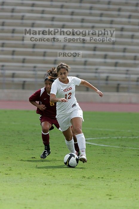 UT sophomore Alisha Ortiz (#12, Forward).  The University of Texas women's soccer team won 2-1 against the Iowa State Cyclones Sunday afternoon, October 5, 2008.

Filename: SRM_20081005_12171436.jpg
Aperture: f/5.6
Shutter Speed: 1/1600
Body: Canon EOS-1D Mark II
Lens: Canon EF 300mm f/2.8 L IS