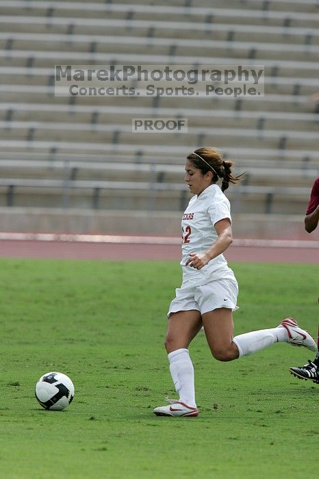 UT sophomore Alisha Ortiz (#12, Forward).  The University of Texas women's soccer team won 2-1 against the Iowa State Cyclones Sunday afternoon, October 5, 2008.

Filename: SRM_20081005_12171638.jpg
Aperture: f/5.6
Shutter Speed: 1/1600
Body: Canon EOS-1D Mark II
Lens: Canon EF 300mm f/2.8 L IS