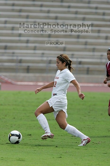 UT sophomore Alisha Ortiz (#12, Forward).  The University of Texas women's soccer team won 2-1 against the Iowa State Cyclones Sunday afternoon, October 5, 2008.

Filename: SRM_20081005_12171639.jpg
Aperture: f/5.6
Shutter Speed: 1/1600
Body: Canon EOS-1D Mark II
Lens: Canon EF 300mm f/2.8 L IS