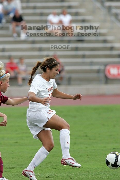 UT sophomore Alisha Ortiz (#12, Forward).  The University of Texas women's soccer team won 2-1 against the Iowa State Cyclones Sunday afternoon, October 5, 2008.

Filename: SRM_20081005_12184054.jpg
Aperture: f/5.6
Shutter Speed: 1/1250
Body: Canon EOS-1D Mark II
Lens: Canon EF 300mm f/2.8 L IS