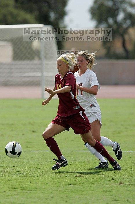 UT sophomore Niki Arlitt (#11, Forward).  The University of Texas women's soccer team won 2-1 against the Iowa State Cyclones Sunday afternoon, October 5, 2008.

Filename: SRM_20081005_12202680.jpg
Aperture: f/5.6
Shutter Speed: 1/2000
Body: Canon EOS-1D Mark II
Lens: Canon EF 300mm f/2.8 L IS