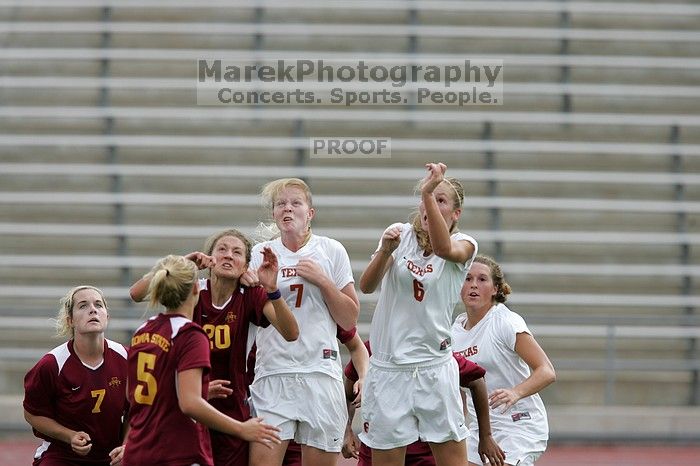 UT freshman Lucy Keith (#6, Midfielder) and UT freshman Courtney Goodson (#7, Forward and Midfielder) fight for the header as UT senior Kasey Moore (#14, Defender) watches.  Keith makes contact, which was an assist to UT junior Emily Anderson (#21, Forward).  The University of Texas women's soccer team won 2-1 against the Iowa State Cyclones Sunday afternoon, October 5, 2008.

Filename: SRM_20081005_12210083.jpg
Aperture: f/5.0
Shutter Speed: 1/1600
Body: Canon EOS-1D Mark II
Lens: Canon EF 300mm f/2.8 L IS