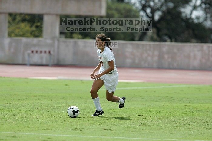 UT senior Stephanie Logterman (#10, Defender).  The University of Texas women's soccer team won 2-1 against the Iowa State Cyclones Sunday afternoon, October 5, 2008.

Filename: SRM_20081005_12221410.jpg
Aperture: f/5.0
Shutter Speed: 1/2500
Body: Canon EOS-1D Mark II
Lens: Canon EF 300mm f/2.8 L IS