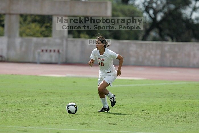 UT senior Stephanie Logterman (#10, Defender).  The University of Texas women's soccer team won 2-1 against the Iowa State Cyclones Sunday afternoon, October 5, 2008.

Filename: SRM_20081005_12221611.jpg
Aperture: f/5.0
Shutter Speed: 1/2500
Body: Canon EOS-1D Mark II
Lens: Canon EF 300mm f/2.8 L IS