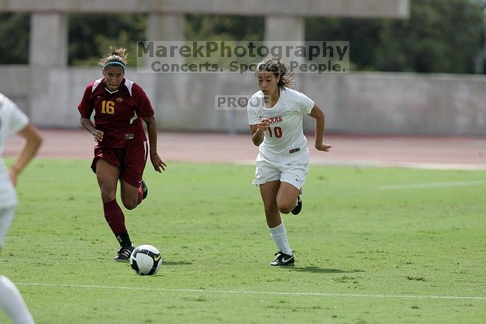 UT senior Stephanie Logterman (#10, Defender).  The University of Texas women's soccer team won 2-1 against the Iowa State Cyclones Sunday afternoon, October 5, 2008.

Filename: SRM_20081005_12221612.jpg
Aperture: f/5.0
Shutter Speed: 1/2500
Body: Canon EOS-1D Mark II
Lens: Canon EF 300mm f/2.8 L IS