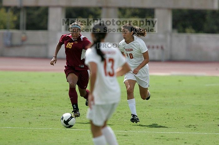 UT senior Stephanie Logterman (#10, Defender).  The University of Texas women's soccer team won 2-1 against the Iowa State Cyclones Sunday afternoon, October 5, 2008.

Filename: SRM_20081005_12221614.jpg
Aperture: f/5.0
Shutter Speed: 1/2500
Body: Canon EOS-1D Mark II
Lens: Canon EF 300mm f/2.8 L IS