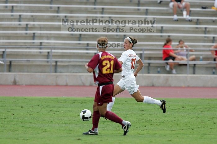 UT sophomore Erica Campanelli (#19, Defender).  The University of Texas women's soccer team won 2-1 against the Iowa State Cyclones Sunday afternoon, October 5, 2008.

Filename: SRM_20081005_12223622.jpg
Aperture: f/5.0
Shutter Speed: 1/1600
Body: Canon EOS-1D Mark II
Lens: Canon EF 300mm f/2.8 L IS