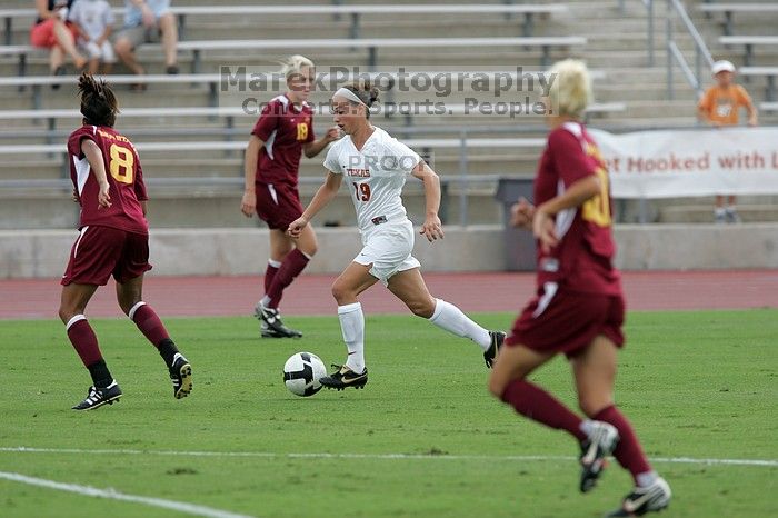 UT sophomore Erica Campanelli (#19, Defender).  The University of Texas women's soccer team won 2-1 against the Iowa State Cyclones Sunday afternoon, October 5, 2008.

Filename: SRM_20081005_12223825.jpg
Aperture: f/5.0
Shutter Speed: 1/1600
Body: Canon EOS-1D Mark II
Lens: Canon EF 300mm f/2.8 L IS