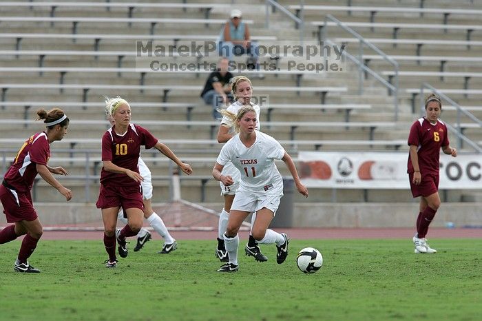 UT sophomore Niki Arlitt (#11, Forward).  The University of Texas women's soccer team won 2-1 against the Iowa State Cyclones Sunday afternoon, October 5, 2008.

Filename: SRM_20081005_12242840.jpg
Aperture: f/5.6
Shutter Speed: 1/1250
Body: Canon EOS-1D Mark II
Lens: Canon EF 300mm f/2.8 L IS