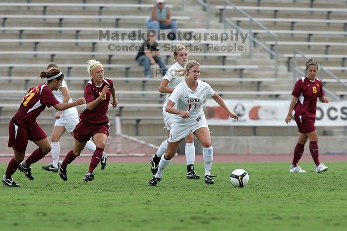 UT sophomore Niki Arlitt (#11, Forward).  The University of Texas women's soccer team won 2-1 against the Iowa State Cyclones Sunday afternoon, October 5, 2008.

Filename: SRM_20081005_12242841.jpg
Aperture: f/5.6
Shutter Speed: 1/1250
Body: Canon EOS-1D Mark II
Lens: Canon EF 300mm f/2.8 L IS