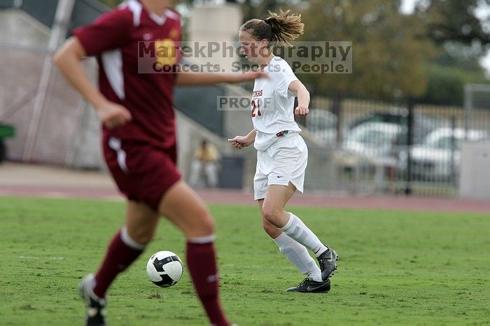 UT junior Emily Anderson (#21, Forward).  The University of Texas women's soccer team won 2-1 against the Iowa State Cyclones Sunday afternoon, October 5, 2008.

Filename: SRM_20081005_12243244.jpg
Aperture: f/5.6
Shutter Speed: 1/1250
Body: Canon EOS-1D Mark II
Lens: Canon EF 300mm f/2.8 L IS