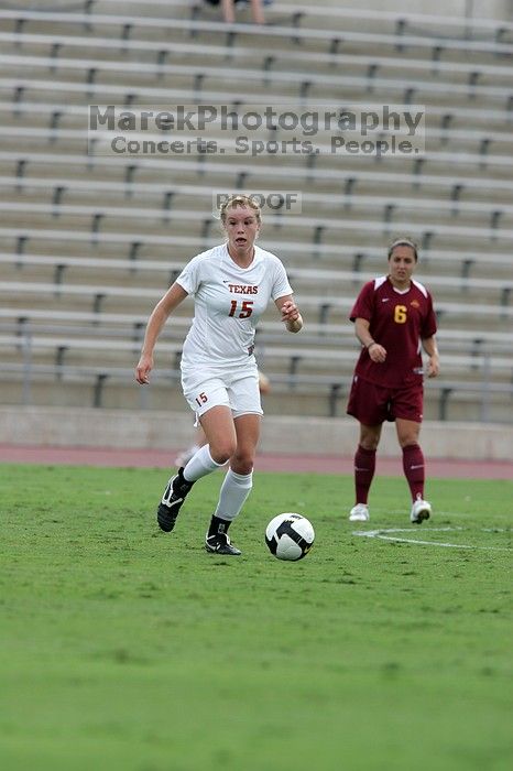 UT freshman Kylie Doniak (#15, Midfielder).  The University of Texas women's soccer team won 2-1 against the Iowa State Cyclones Sunday afternoon, October 5, 2008.

Filename: SRM_20081005_12244448.jpg
Aperture: f/5.6
Shutter Speed: 1/1250
Body: Canon EOS-1D Mark II
Lens: Canon EF 300mm f/2.8 L IS