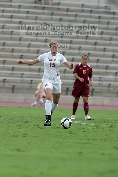 UT freshman Kylie Doniak (#15, Midfielder).  The University of Texas women's soccer team won 2-1 against the Iowa State Cyclones Sunday afternoon, October 5, 2008.

Filename: SRM_20081005_12244449.jpg
Aperture: f/5.6
Shutter Speed: 1/1250
Body: Canon EOS-1D Mark II
Lens: Canon EF 300mm f/2.8 L IS