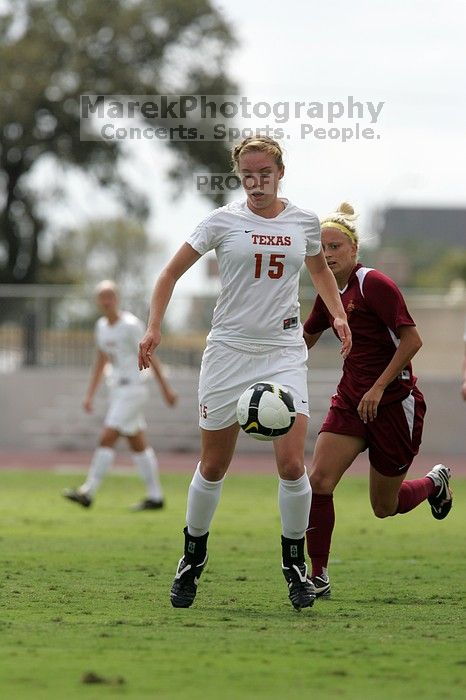 UT freshman Kylie Doniak (#15, Midfielder).  The University of Texas women's soccer team won 2-1 against the Iowa State Cyclones Sunday afternoon, October 5, 2008.

Filename: SRM_20081005_12260460.jpg
Aperture: f/5.6
Shutter Speed: 1/2000
Body: Canon EOS-1D Mark II
Lens: Canon EF 300mm f/2.8 L IS