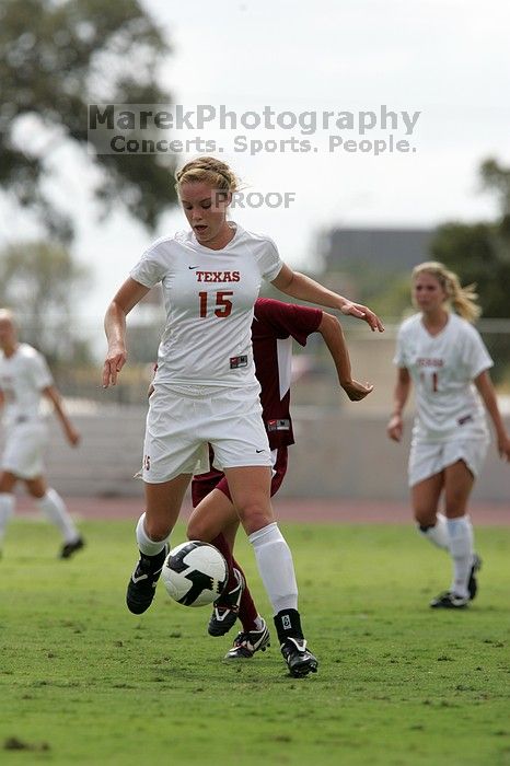 UT freshman Kylie Doniak (#15, Midfielder).  The University of Texas women's soccer team won 2-1 against the Iowa State Cyclones Sunday afternoon, October 5, 2008.

Filename: SRM_20081005_12260661.jpg
Aperture: f/5.6
Shutter Speed: 1/2000
Body: Canon EOS-1D Mark II
Lens: Canon EF 300mm f/2.8 L IS