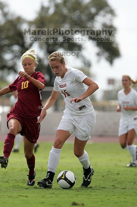 UT freshman Kylie Doniak (#15, Midfielder).  The University of Texas women's soccer team won 2-1 against the Iowa State Cyclones Sunday afternoon, October 5, 2008.

Filename: SRM_20081005_12260665.jpg
Aperture: f/5.6
Shutter Speed: 1/2000
Body: Canon EOS-1D Mark II
Lens: Canon EF 300mm f/2.8 L IS