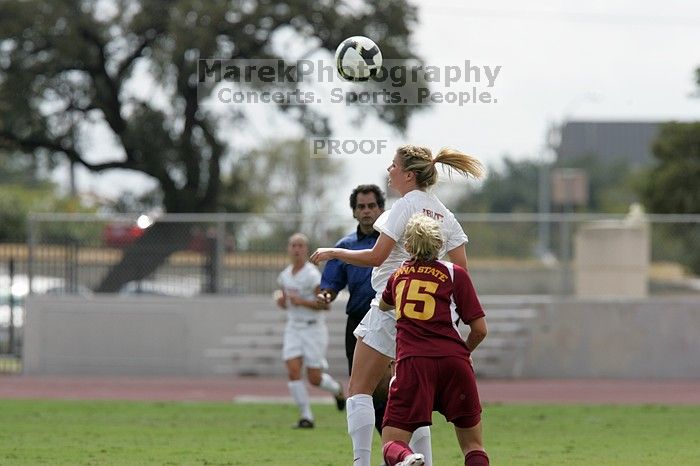 UT sophomore Niki Arlitt (#11, Forward) jumps up for the header.  The University of Texas women's soccer team won 2-1 against the Iowa State Cyclones Sunday afternoon, October 5, 2008.

Filename: SRM_20081005_12291478.jpg
Aperture: f/5.6
Shutter Speed: 1/1600
Body: Canon EOS-1D Mark II
Lens: Canon EF 300mm f/2.8 L IS