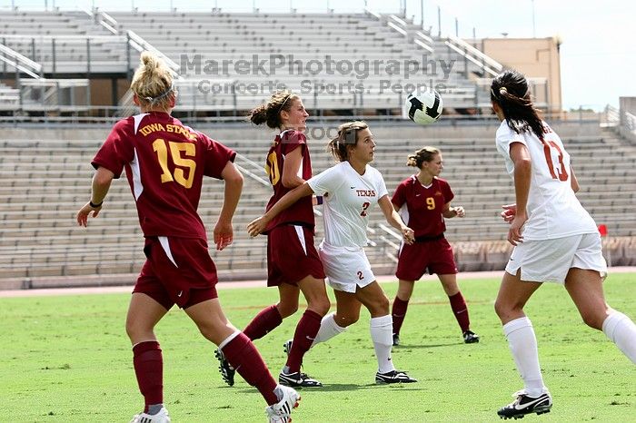 UT sophomore Kirsten Birkhold (#2, Forward and Midfielder) waits for the header.  The University of Texas women's soccer team won 2-1 against the Iowa State Cyclones Sunday afternoon, October 5, 2008.

Filename: SRM_20081005_12310649.jpg
Aperture: f/5.6
Shutter Speed: 1/1600
Body: Canon EOS 20D
Lens: Canon EF 80-200mm f/2.8 L