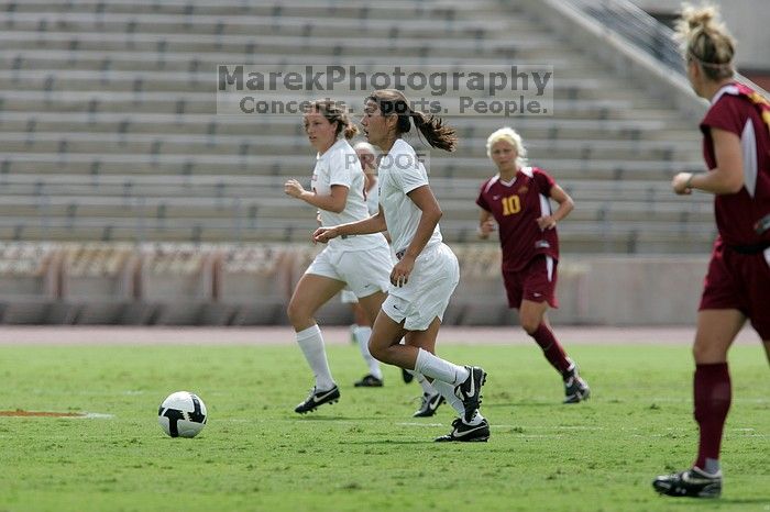 UT senior Stephanie Logterman (#10, Defender) runs with the ball.  The University of Texas women's soccer team won 2-1 against the Iowa State Cyclones Sunday afternoon, October 5, 2008.

Filename: SRM_20081005_12314610.jpg
Aperture: f/5.6
Shutter Speed: 1/2000
Body: Canon EOS-1D Mark II
Lens: Canon EF 300mm f/2.8 L IS