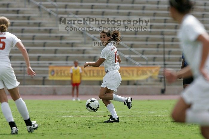 UT senior Stephanie Logterman (#10, Defender) runs with the ball.  The University of Texas women's soccer team won 2-1 against the Iowa State Cyclones Sunday afternoon, October 5, 2008.

Filename: SRM_20081005_12314811.jpg
Aperture: f/5.6
Shutter Speed: 1/2000
Body: Canon EOS-1D Mark II
Lens: Canon EF 300mm f/2.8 L IS