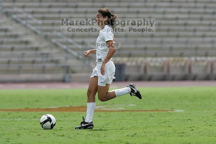 UT senior Stephanie Logterman (#10, Defender) runs with the ball.  The University of Texas women's soccer team won 2-1 against the Iowa State Cyclones Sunday afternoon, October 5, 2008.

Filename: SRM_20081005_12322613.jpg
Aperture: f/5.6
Shutter Speed: 1/2000
Body: Canon EOS-1D Mark II
Lens: Canon EF 300mm f/2.8 L IS