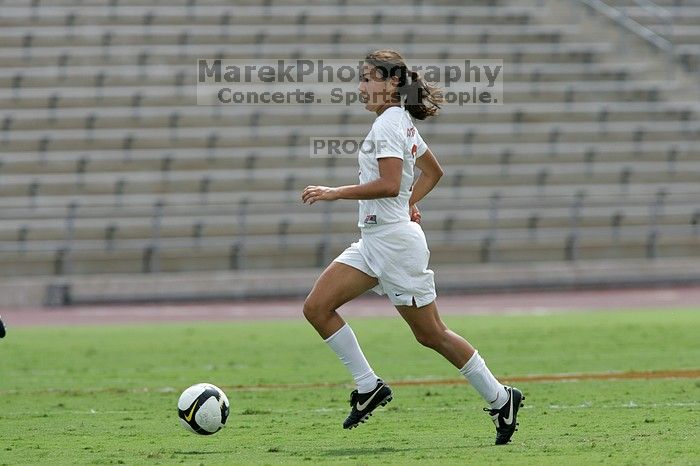 UT senior Stephanie Logterman (#10, Defender) runs with the ball.  The University of Texas women's soccer team won 2-1 against the Iowa State Cyclones Sunday afternoon, October 5, 2008.

Filename: SRM_20081005_12322816.jpg
Aperture: f/5.6
Shutter Speed: 1/2000
Body: Canon EOS-1D Mark II
Lens: Canon EF 300mm f/2.8 L IS