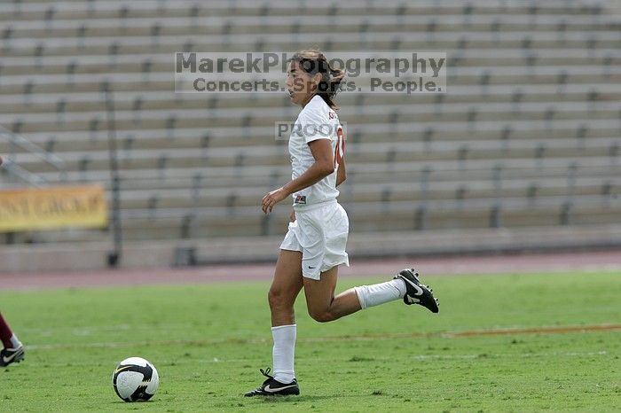 UT senior Stephanie Logterman (#10, Defender) runs with the ball.  The University of Texas women's soccer team won 2-1 against the Iowa State Cyclones Sunday afternoon, October 5, 2008.

Filename: SRM_20081005_12322817.jpg
Aperture: f/5.6
Shutter Speed: 1/2000
Body: Canon EOS-1D Mark II
Lens: Canon EF 300mm f/2.8 L IS