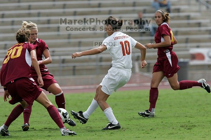 UT senior Stephanie Logterman (#10, Defender) runs with the ball.  The University of Texas women's soccer team won 2-1 against the Iowa State Cyclones Sunday afternoon, October 5, 2008.

Filename: SRM_20081005_12323022.jpg
Aperture: f/5.6
Shutter Speed: 1/2000
Body: Canon EOS-1D Mark II
Lens: Canon EF 300mm f/2.8 L IS