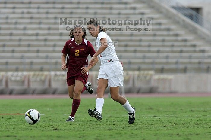 UT senior Stephanie Logterman (#10, Defender) makes a run with the ball.  The University of Texas women's soccer team won 2-1 against the Iowa State Cyclones Sunday afternoon, October 5, 2008.

Filename: SRM_20081005_12372663.jpg
Aperture: f/5.6
Shutter Speed: 1/1250
Body: Canon EOS-1D Mark II
Lens: Canon EF 300mm f/2.8 L IS