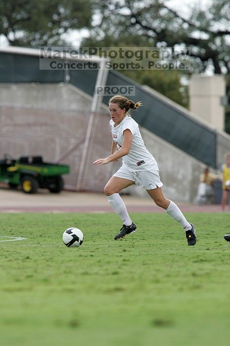 UT senior Kasey Moore (#14, Defender).  The University of Texas women's soccer team won 2-1 against the Iowa State Cyclones Sunday afternoon, October 5, 2008.

Filename: SRM_20081005_12392668.jpg
Aperture: f/5.6
Shutter Speed: 1/1000
Body: Canon EOS-1D Mark II
Lens: Canon EF 300mm f/2.8 L IS