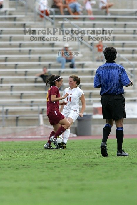 UT senior Kasey Moore (#14, Defender).  The University of Texas women's soccer team won 2-1 against the Iowa State Cyclones Sunday afternoon, October 5, 2008.

Filename: SRM_20081005_12394078.jpg
Aperture: f/5.6
Shutter Speed: 1/1250
Body: Canon EOS-1D Mark II
Lens: Canon EF 300mm f/2.8 L IS