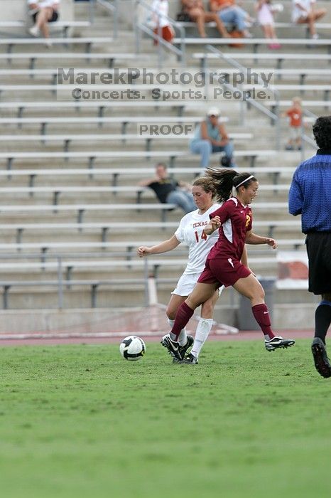 UT senior Kasey Moore (#14, Defender).  The University of Texas women's soccer team won 2-1 against the Iowa State Cyclones Sunday afternoon, October 5, 2008.

Filename: SRM_20081005_12394079.jpg
Aperture: f/5.6
Shutter Speed: 1/1000
Body: Canon EOS-1D Mark II
Lens: Canon EF 300mm f/2.8 L IS